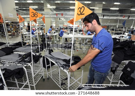 Turkey textile industry,July 24, 2014. Textile is very important sector for turkish economy. At the same time this sector is generating  employment. The workers are seen on the picture in a factory