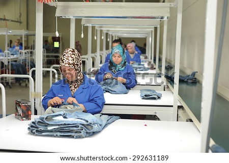 JULY 24,2014 - ISTANBUL_TURKEY. Textile is very important sector for turkish economy. At the same time this sector is generating employment. The workers are seen on the picture in a factory