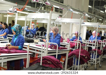 JULY 24,2014 - ISTANBUL,TURKEY. Textile is very important sector for turkish economy. At the same time this sector is generating employment. The workers are seen on the picture in a factory