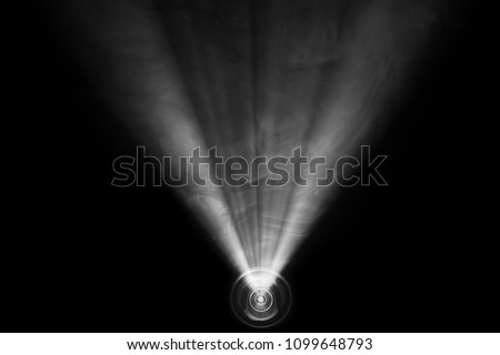 beautiful black and white color wide lens projector with light beam for movie and cinema at night . smoke texture spotlight . screening for multimedia . abstract background .