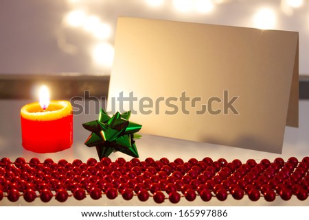 Beautiful ornaments, candles and greeting card as a New Year decoration, New Year decoration, photography