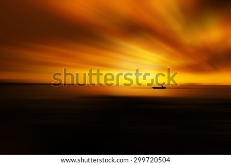 Man riding boat.Photo has motion blur effect added on the sky and beach