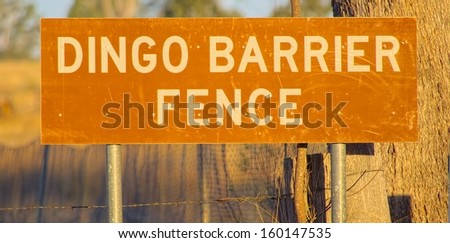 Dingo Barrier Fence Sign at The beginning of the 5300 km fence in Queensland Australia.