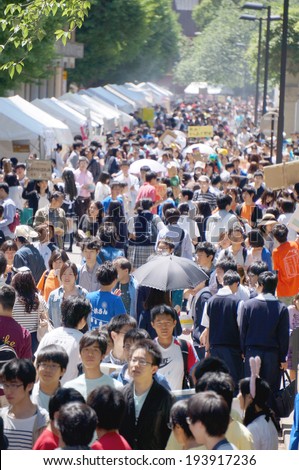 TOKYO, JAPAN - MAY 17: The crowded street at the school festival of The University of Tokyo, MAY 17, 2014. This school festival is known as the biggest school festival in Japan.