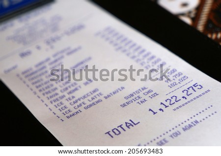 Jakarta, Indonesia- MAY 27 : The restaurant\'s bill in Jakarta on May 27, 2014. This bill claims less than 100 US Dollars, but has 7 digits because of the past inflation in Indonesia.