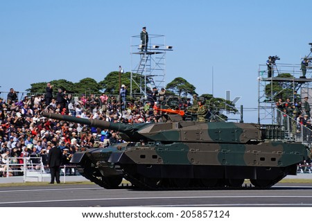 TOKYO- OCTOBER 27: Type 90 Tank in the inspection parade of Japan Ground Self Defense Force in Asaka base, Tokyo on October 27, 2013. This parade is held every three years.