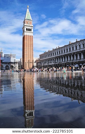 VENICE, ITALY- SEPTEMBER 14: The Puddle which reflects Campanile di San Marco in Piazza San Marco, Venice, Italy on September 14,2014.