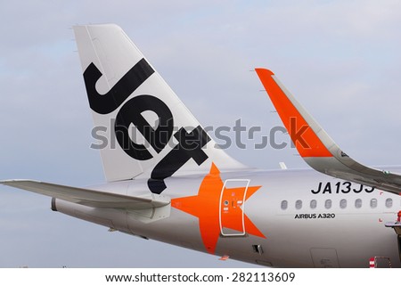Narita, Japan - January 13: The tail logo of Jetstar A320 at Narita Airport on January 13, 2015. Jet Star is an emerging low cost airline in Japan.