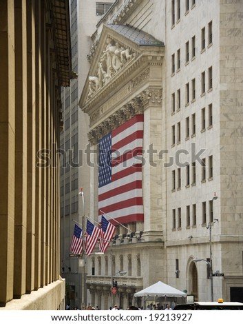 New York Stock Exchange building with American flag, Wall Street, New York, USA