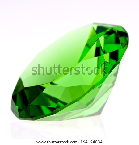 green diamond on white surface