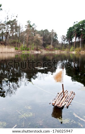A small wooden raft floating in the water.