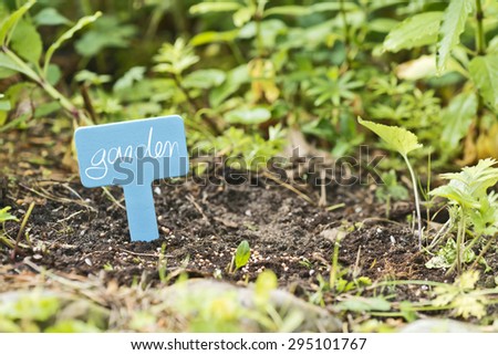 garden soil with a label saying garden