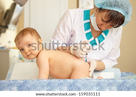 Baby health care and treatment. Medical help. Injection.