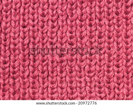 Red handmade knitting texture background