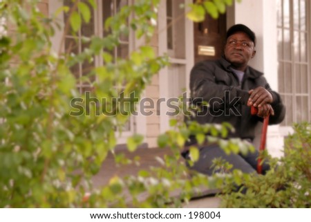 Old man on porch