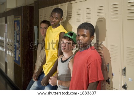 Tough guys at school hanging around the locker.  Great for peer-pressure communication.  The BAD crowd.