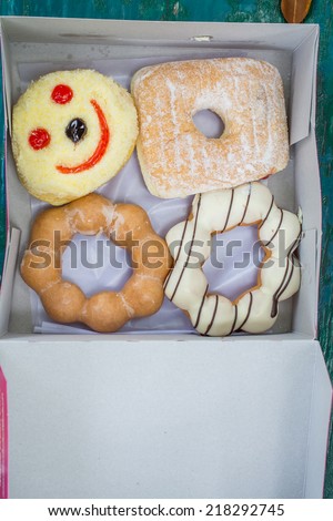 Assorted Colorful Donuts in Box