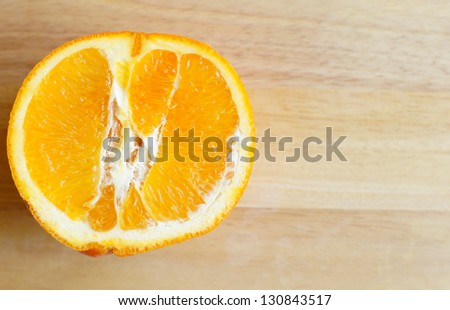 cut orange fruit on the white background