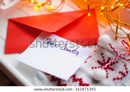 Christmas letter to Santa Claus and different holiday decoration