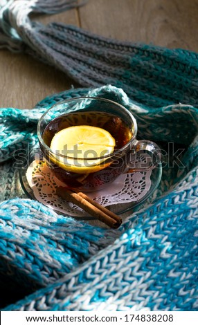 Rose-hip tea with lemon and scarf