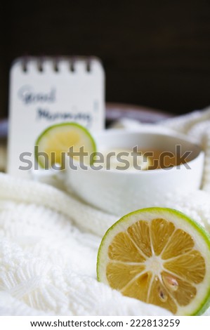 Mug with tea and lemon with Good morning note