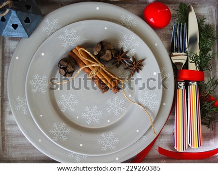 Table decoration for Christmas eve with bright table set