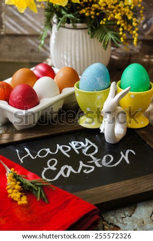 Easter time, spring flowers, easter eggs and  easter bunny