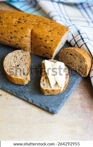 Homemade bread for breakfast on the bright napkin