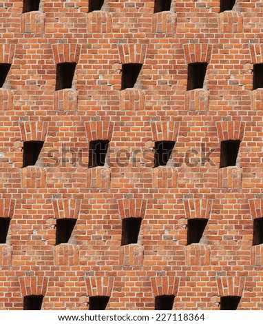 Seamless pattern: Old fortress wall with loopholes