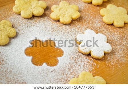 Freshly baked sugar cookies, sprinkled with powdered sugar