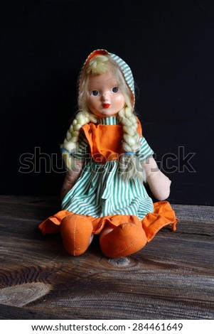 old doll with dress, doll, doll with braids