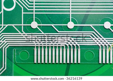 Transparent PC board on a green background