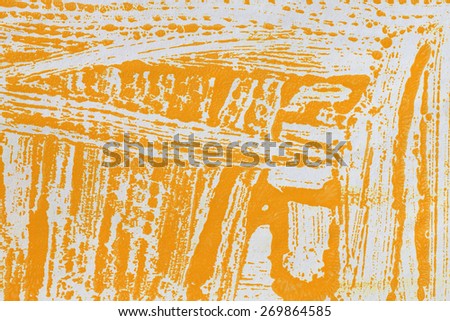 strips orange paint on paper, macro