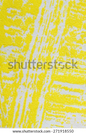 strips yellow paint on paper, macro