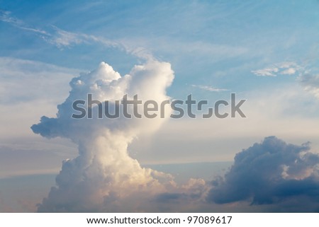 Aerial view of a series of cumulus cloud buildups on a summer day.