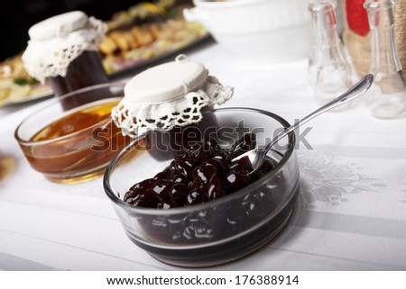 Detail of served food with selective focus on candied cherry.