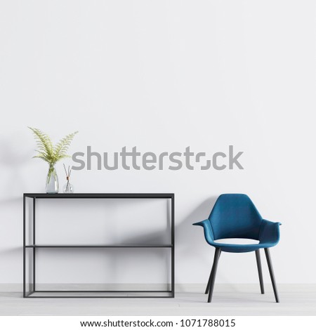 Modern Interior with empty wall for mock-up with shelves with decor and chair in the room. 3D rendering.