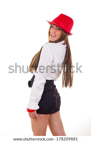 modern smiling young woman in skirt and shirt wearing red hat and necklace