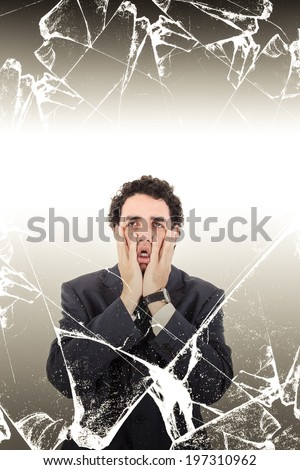 Portrait of man in despair showing misery or sorrow behind broken glass, Overworked businessman with sad look on his face suffering