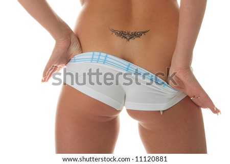 stock photo Beautiful sexy bottom in shorts with tattoo