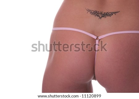 stock photo Beautiful sexy bottom in pants with tattoo