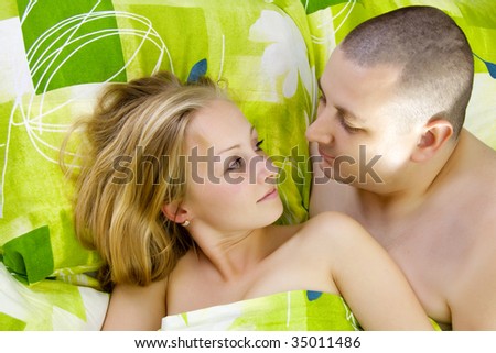 Man and woman in bed.