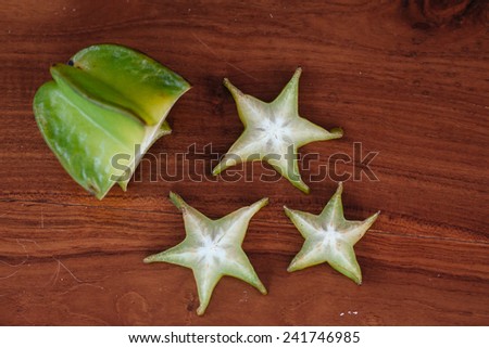 Star apple Carambola (Star Fruit) Fresh ripe star fruit on wooden table