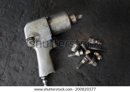 Impact air wrench and bolts.