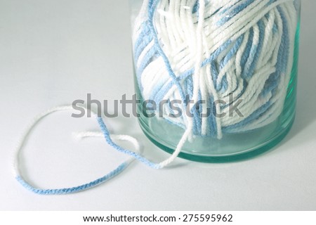Heart yarn thread and Yarn ball in bottle.