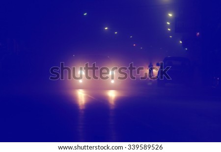 Blurry soft focus background,  the morning of downtown street with  heavy fog. urban city life concept