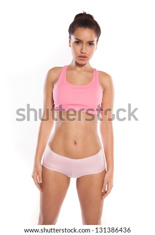 Asian woman wearing pink sportswear against the white background