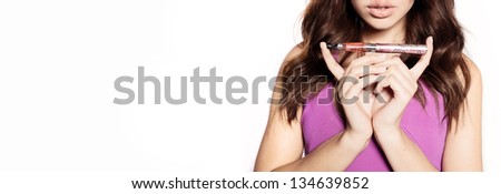 woman smoking e-cigarette wearing purple dress woman smoking e-cigarette wearing purple dress