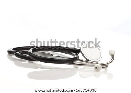 Close-up of a stethoscope, acoustic medical device for listening to the internal sounds of the human body, on white background