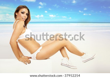 Sexy young woman wearing white lingerie , shirt and sport shoes beach on the background